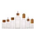 5ml 10ml 15ml 20ml 30ml 50ml 100ml cosmetic round frosted glass dropper bottle with bamboo cap